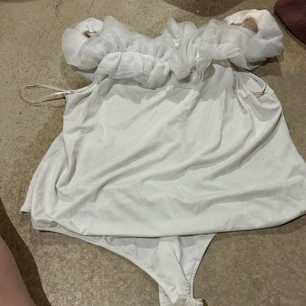 New York & Company White Ruffled off the shoulder bodysuit.